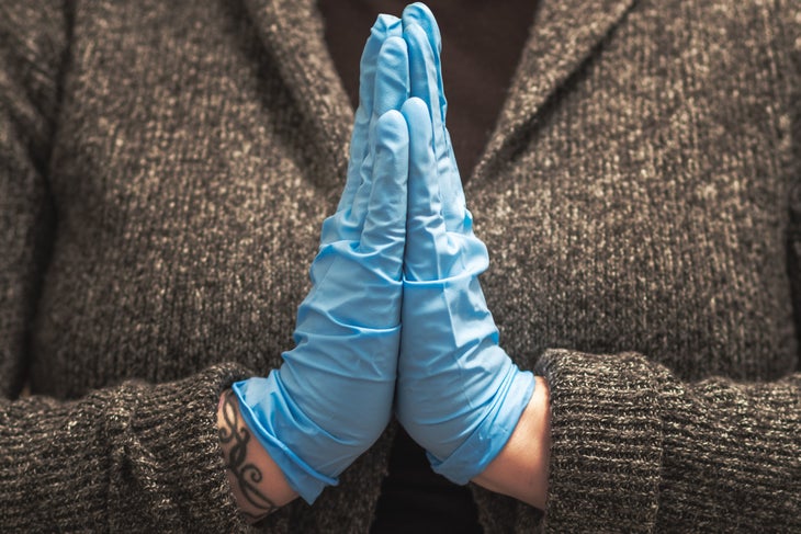 gloves-namaste namaste hands in surgical gloves