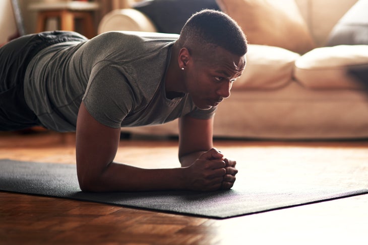 TJS man practicing yoga