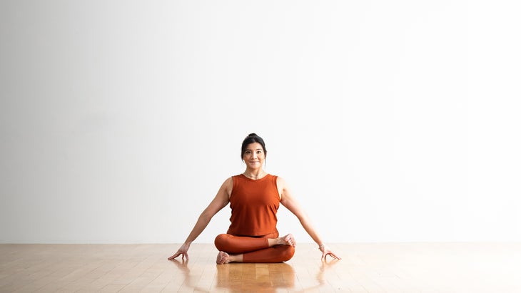 Woman demonstrates Fire Log Pose