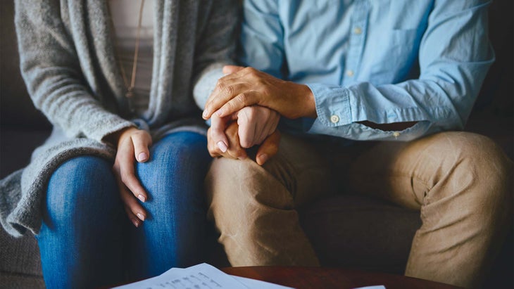 lovesupportgrief A couple holding hands