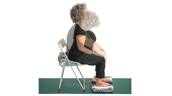 Composite of woman doing cat-cows in a chair