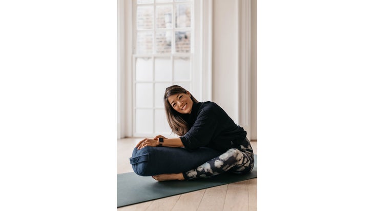 Bound Angle yoga pose with bolster