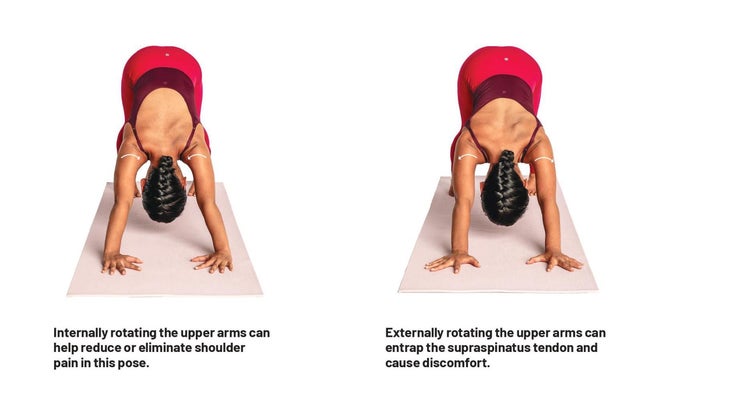 A women illustrates how to improve down dog pose with shoulder stabillity