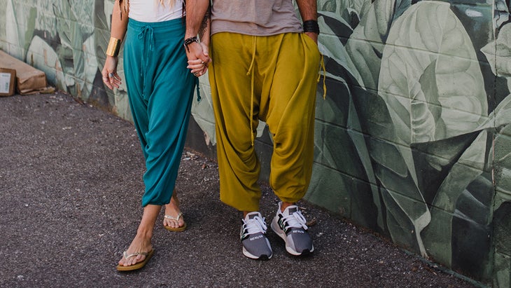 Man and woman wearing Buddha Pants