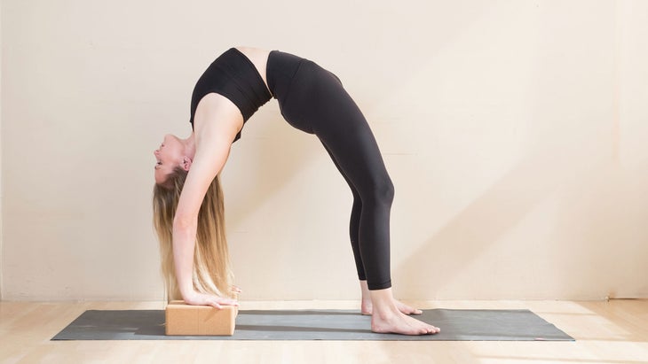 Wheel pose with blocks under your hands