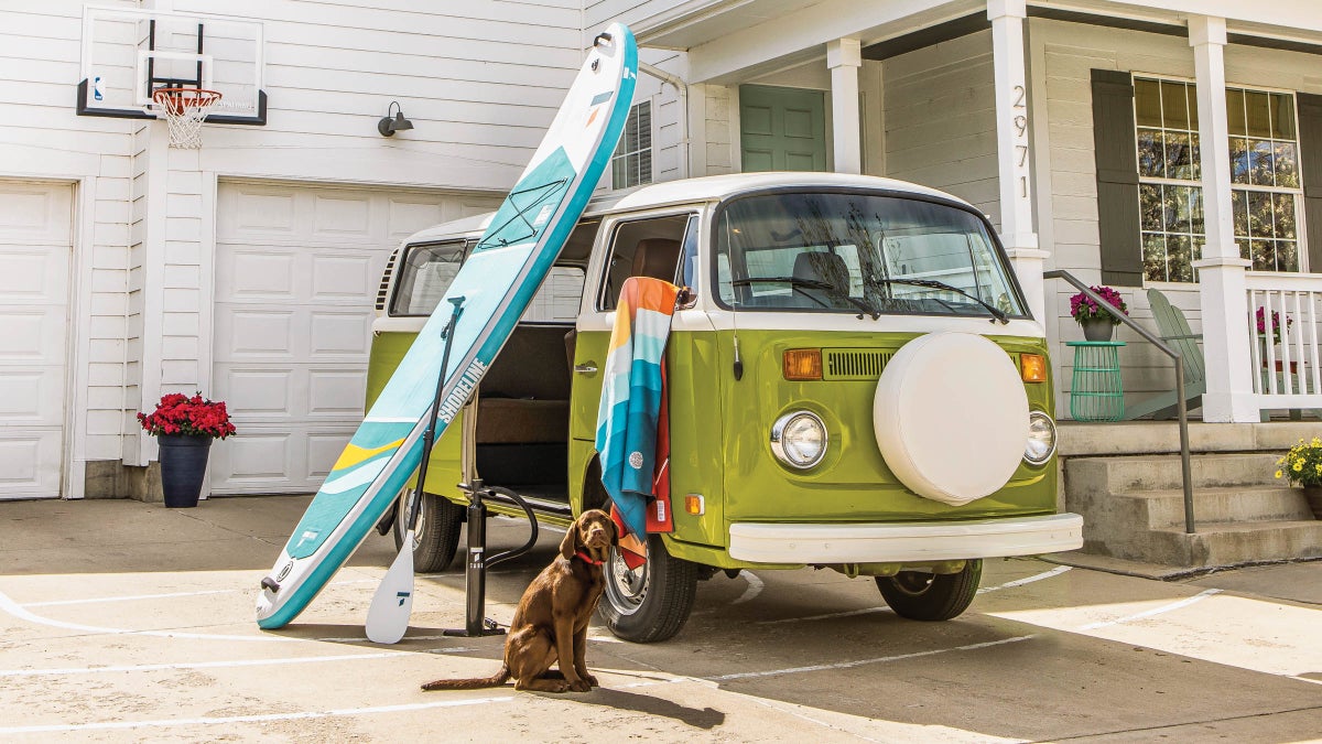 8 Tips for Doing Yoga on a Stand-Up Paddleboard—Without Falling In