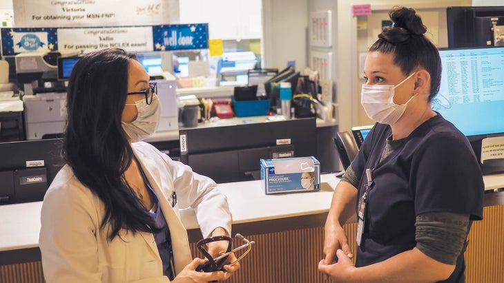 Ingrid Yang and Eileen Carroll in PPE