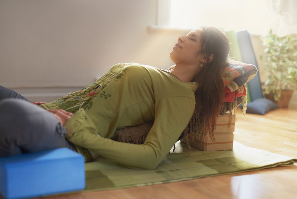 These Restorative Yoga Practices Will Help You Beat Burnout
