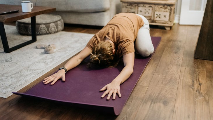 Woman in Child's Pose