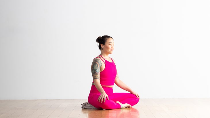 Woman in Easy Pose with hip support