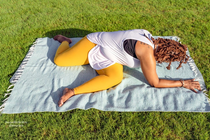 Keisha Battles doing deer pose with a twist