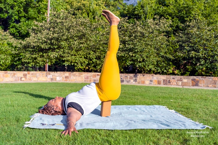 Kiesha Battles in supported legs up the wall_yin