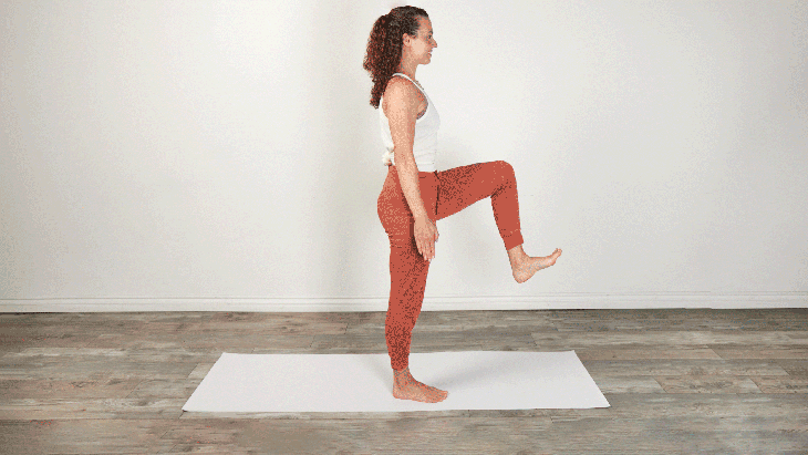 Woman performing Warrior Pose III