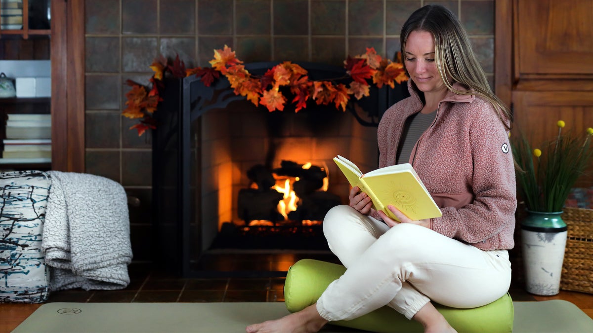 Welcome Cozy Season With a Restorative Hygge-Inspired Yoga Sequence