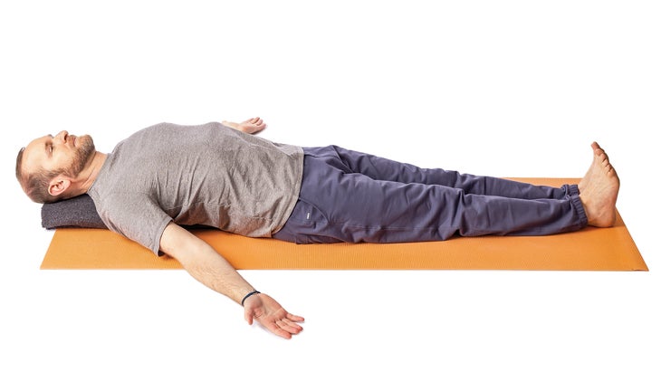 Jivana Heyman in a supported fish pose