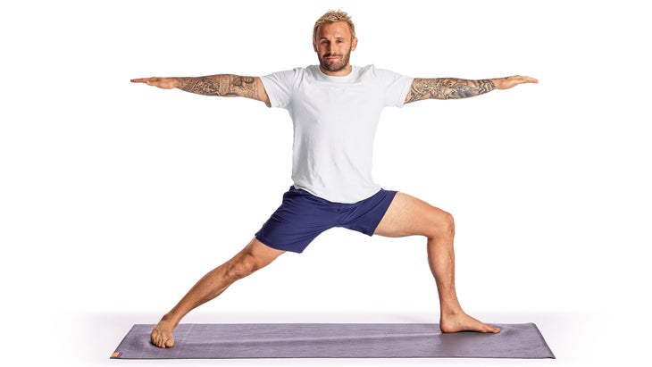 Calvin Corzine in a Warrior II variation