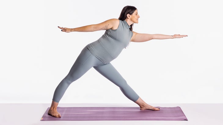 Sarah Ezrin in a Triangle pose variation