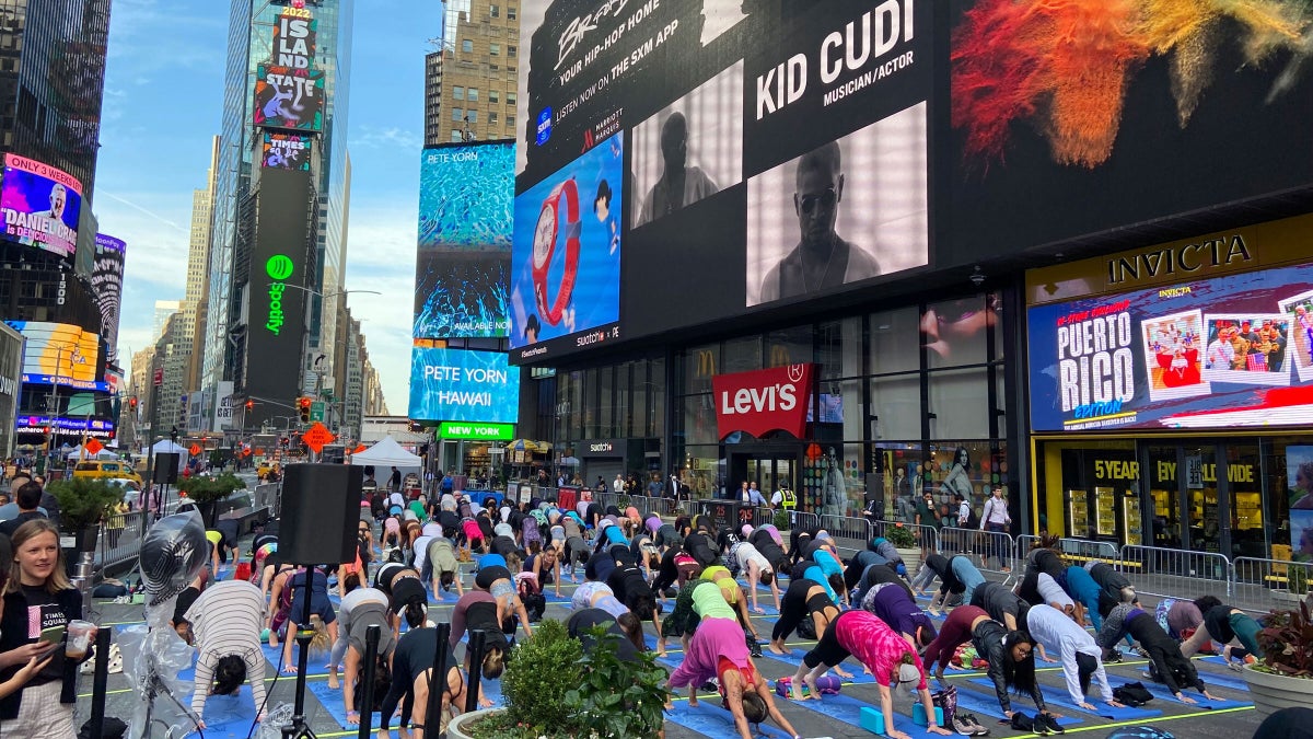Practice With Us: Solstice in Times Square Yoga