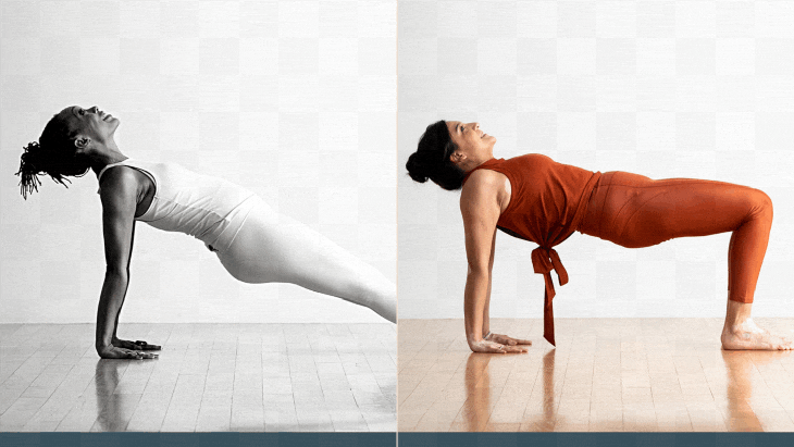 A black woman in light green tights practices reverse plank pose. A woman with dark hair practices reverse table. They are practicing on a plain wood floor against a plain white background.