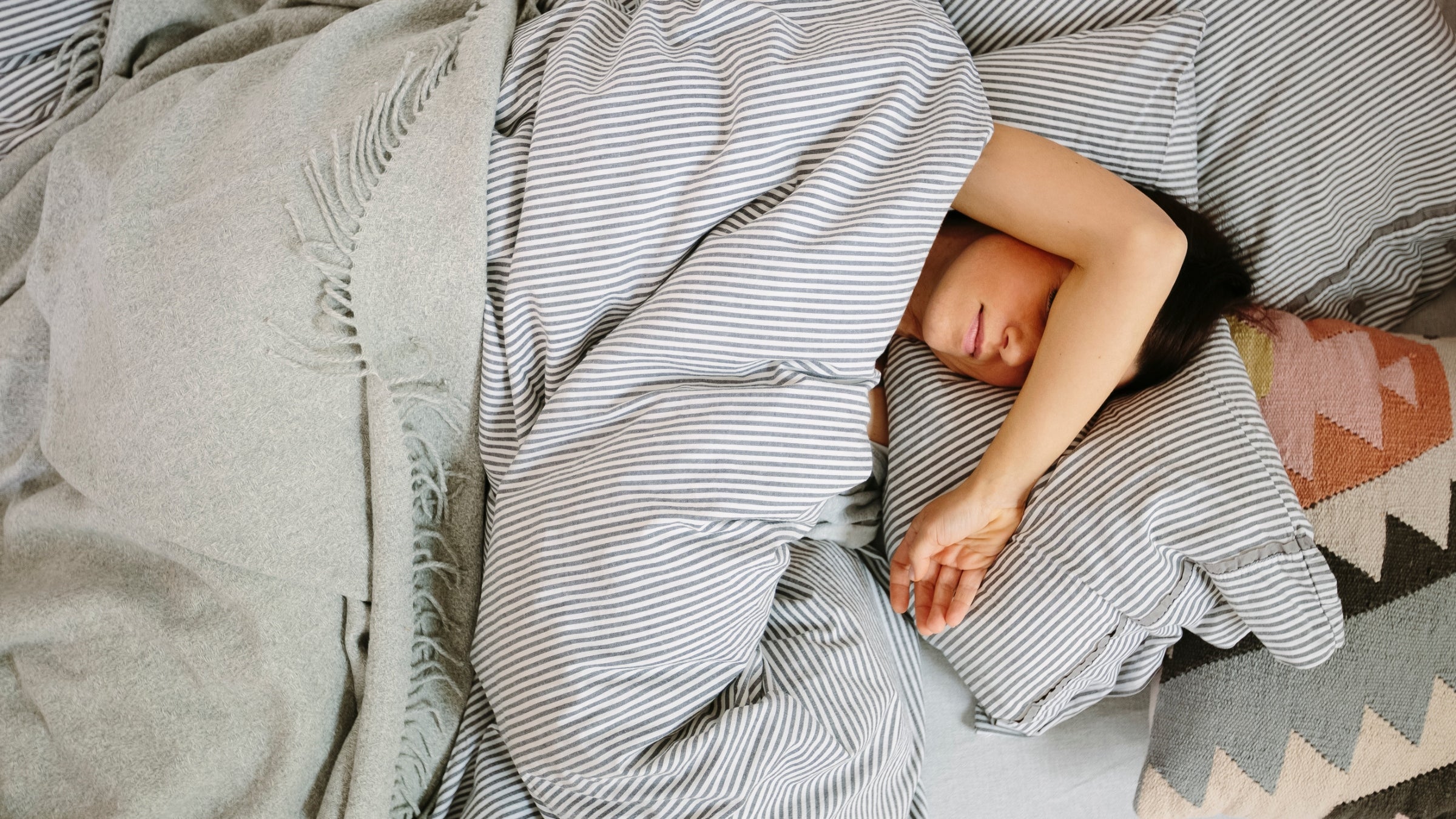 Changing your sleeping habits isn’t as simple as setting your alarm before sunrise and heading to bed at a responsible hour.