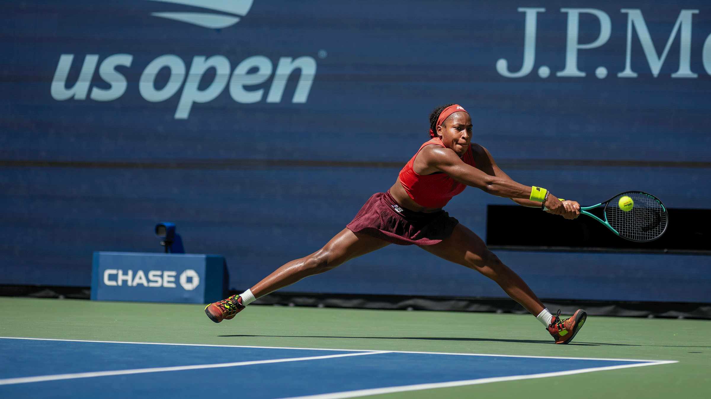 Coco Gauff playing tennis at the U.S. Open after practicing yoga during her training