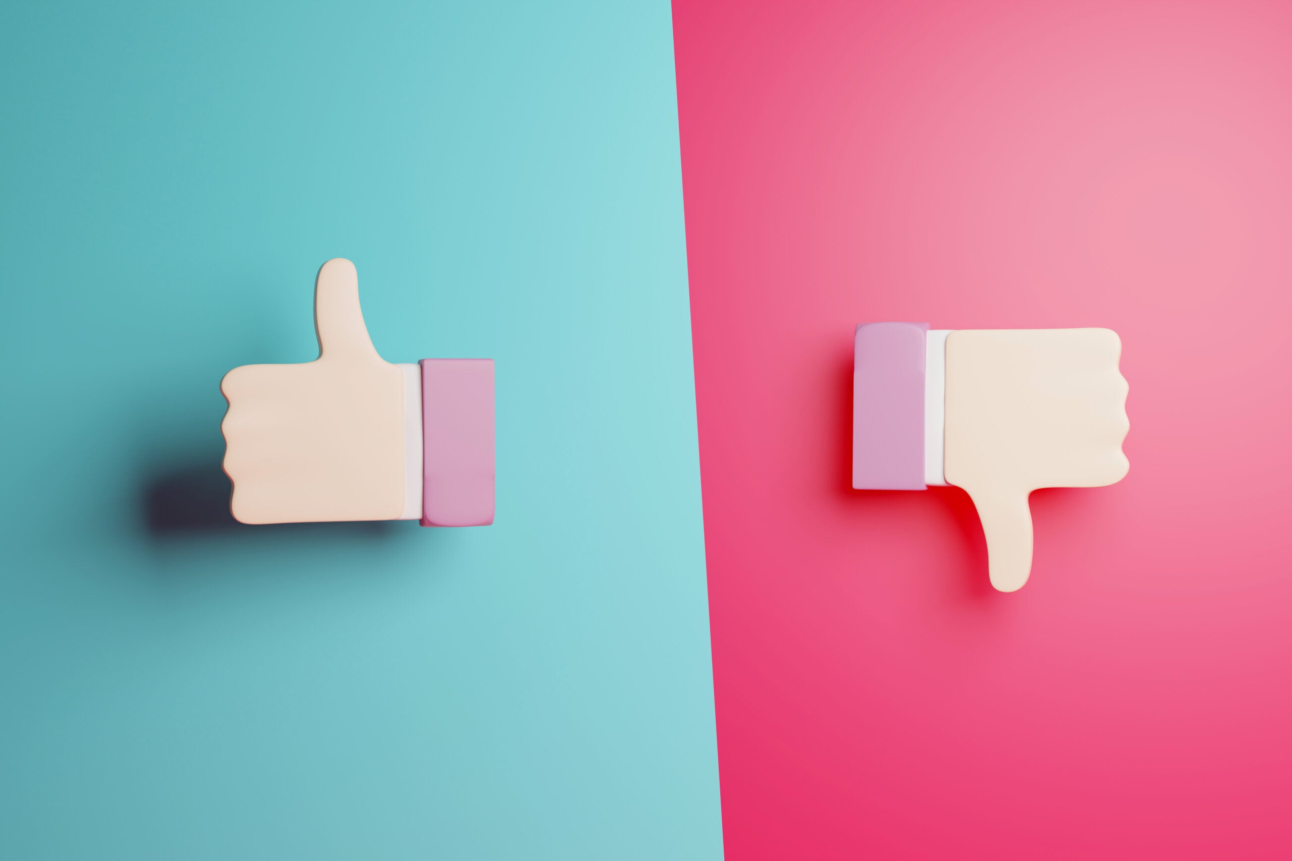 Photo of thumbs up and thumbs down icons. Thumbs up is on the left-hand side against a light blue background. Thumbs down is on the right-hand side against a hot pink background.