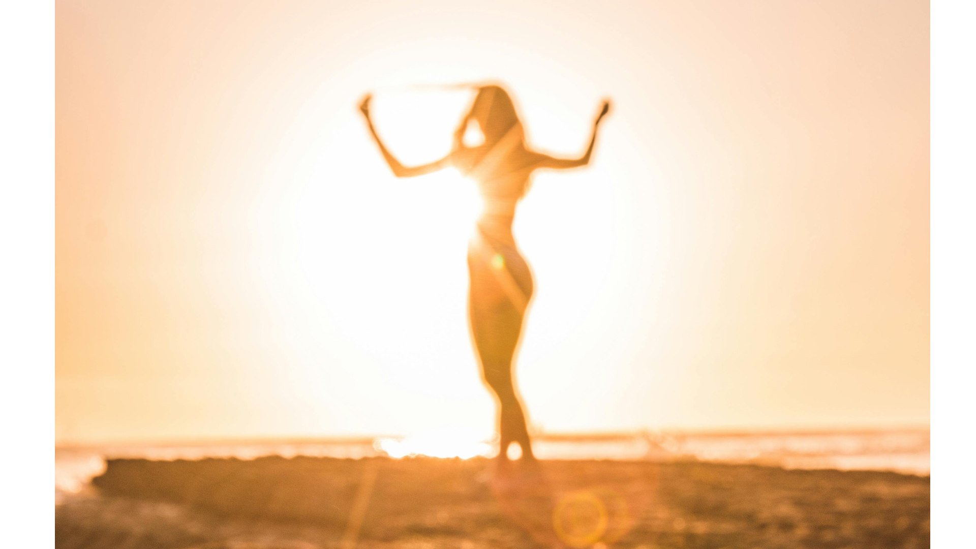 Woman dancing on a beach before sundown while contemplating her weekly horoscope for June 1-7, 2025.