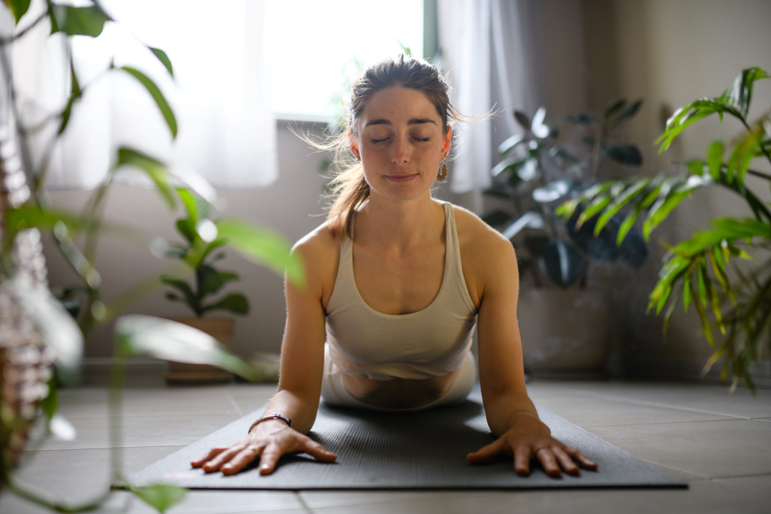 Wrists Bugging You? These 12 Yoga Pose Variations Help You Practice Hands-Free.
