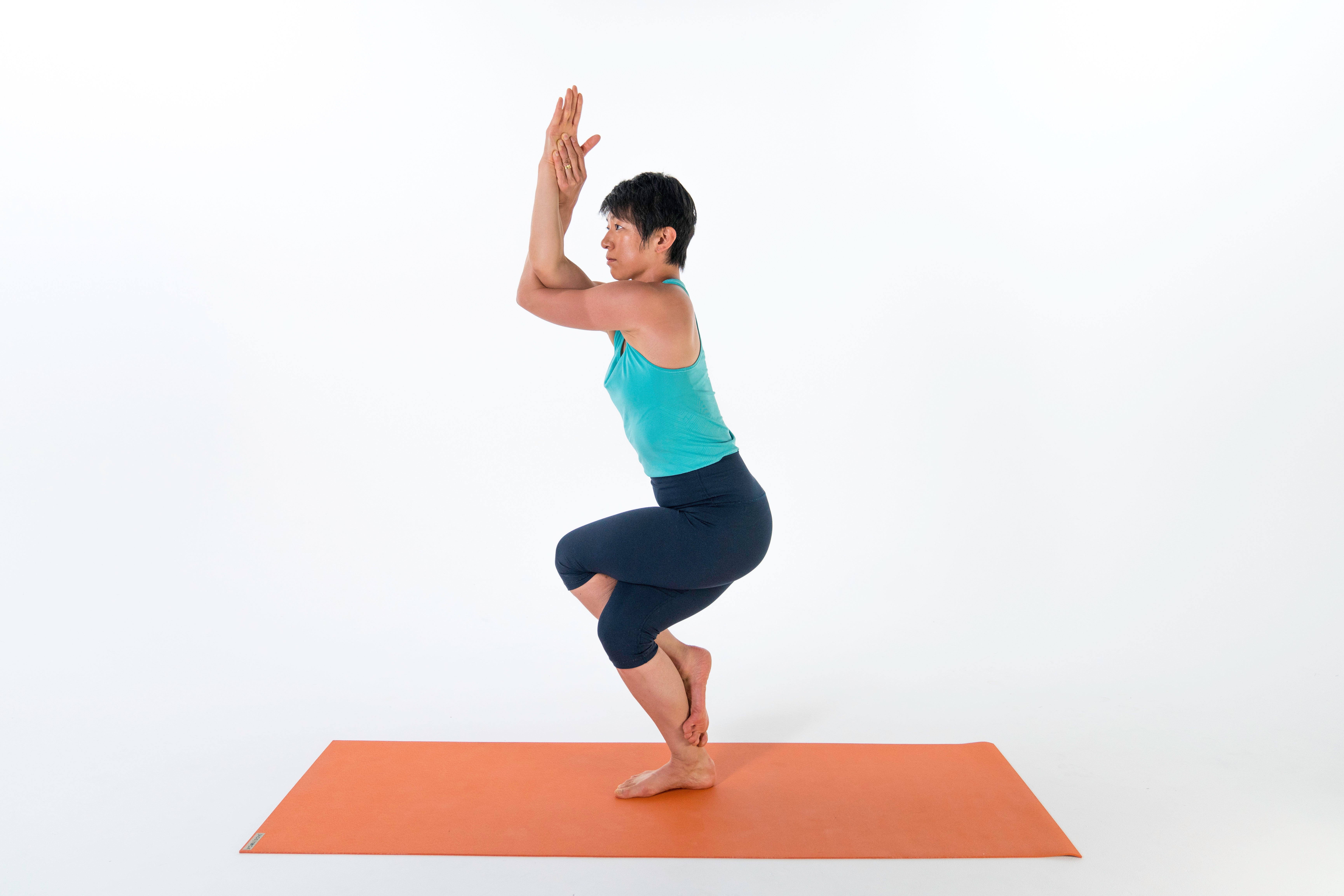 woman in full eagle pose